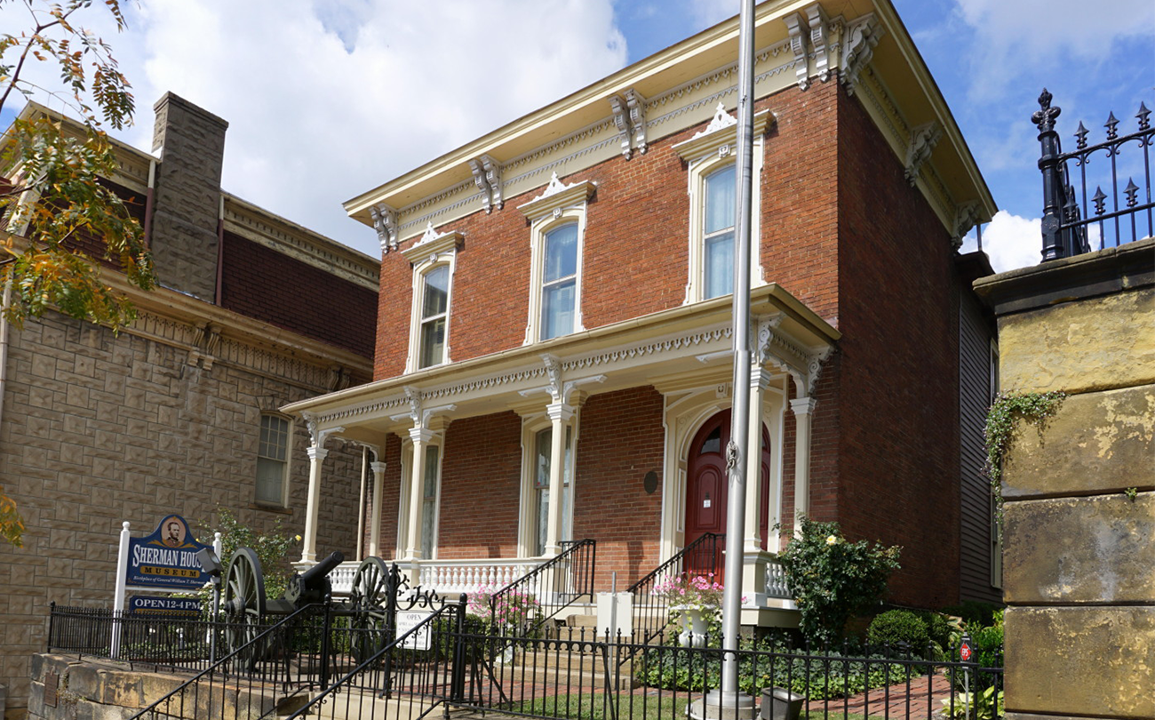 Side view of the Sherman House showing the original 1811 frame home and the 1870 brick front